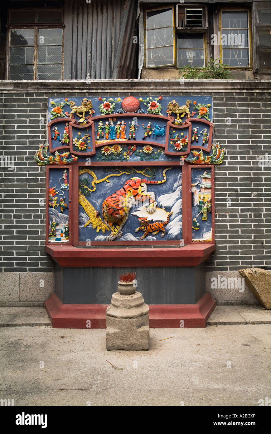 dh Pak Tai Temple CHEUNG CHAU HONG KONG Chinese shrine Tiger mosaic picture courtyard altar taoist painting art taoism china Stock Photo