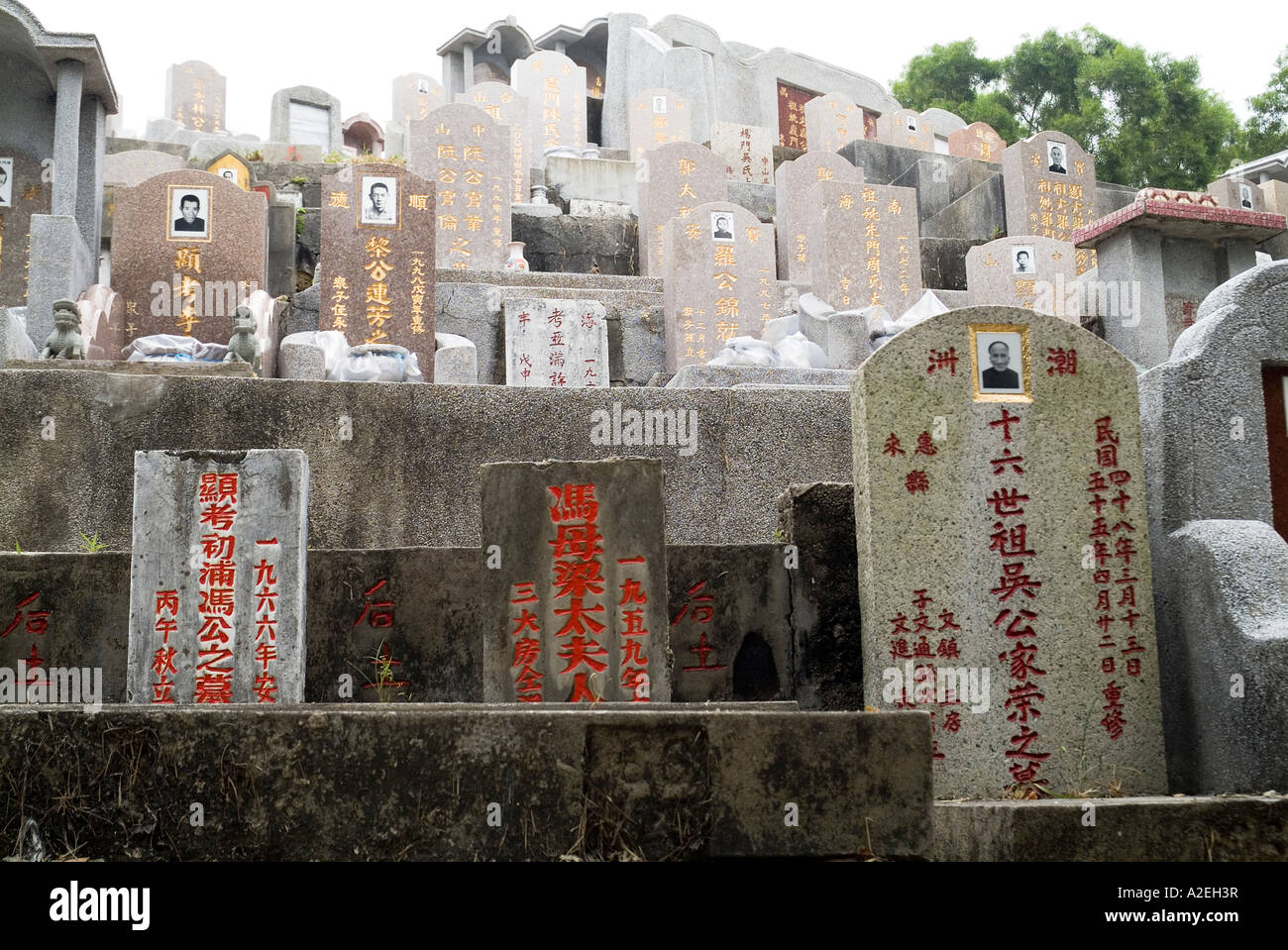 dh Chinese graveyard CHEUNG CHAU HONG KONG Gravestone in cemetery stones graves Stock Photo