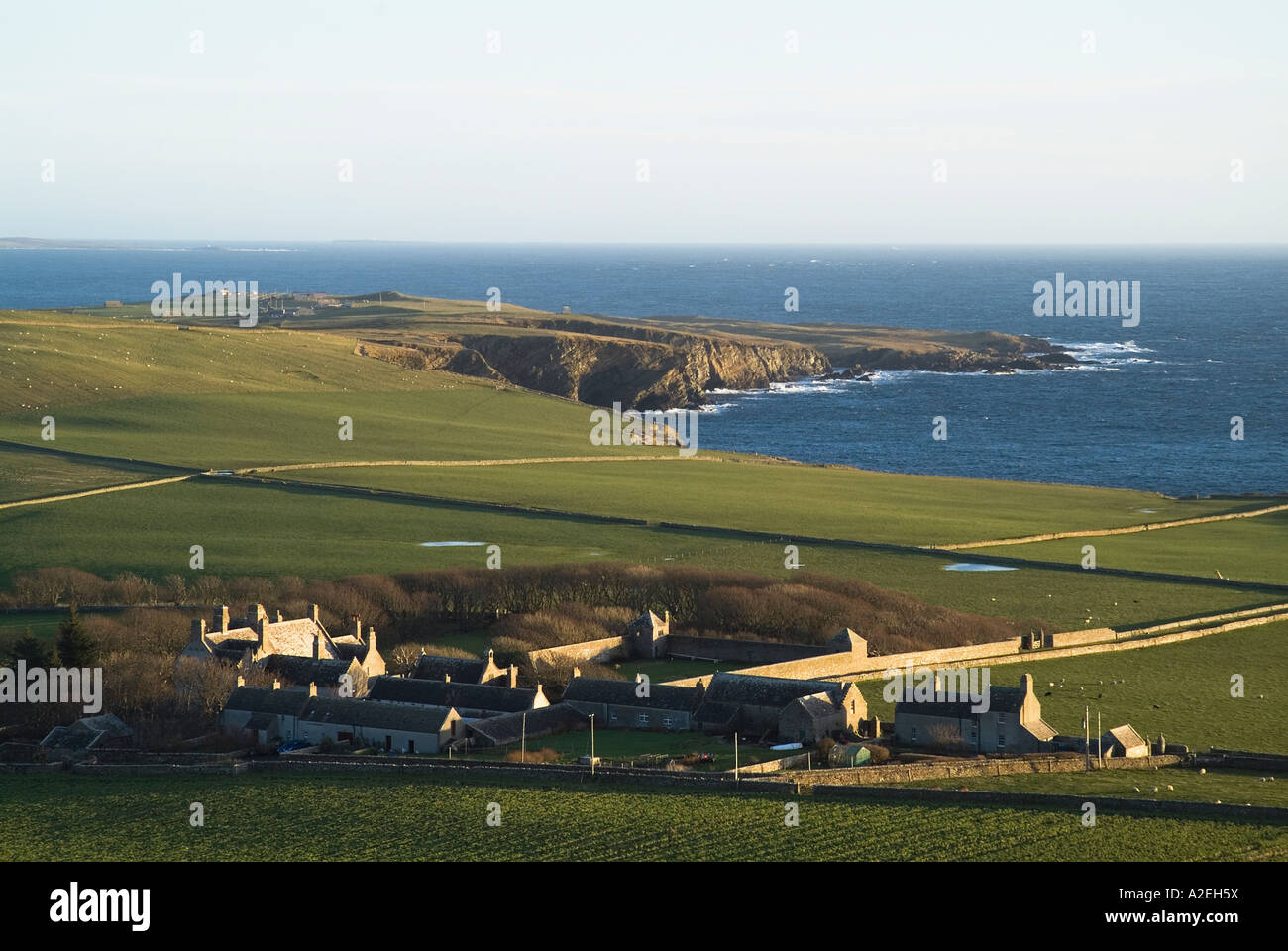 dh Melsetter HOY ORKNEY Melsetter house farm and farmland Pentland Firth cliffs Stock Photo