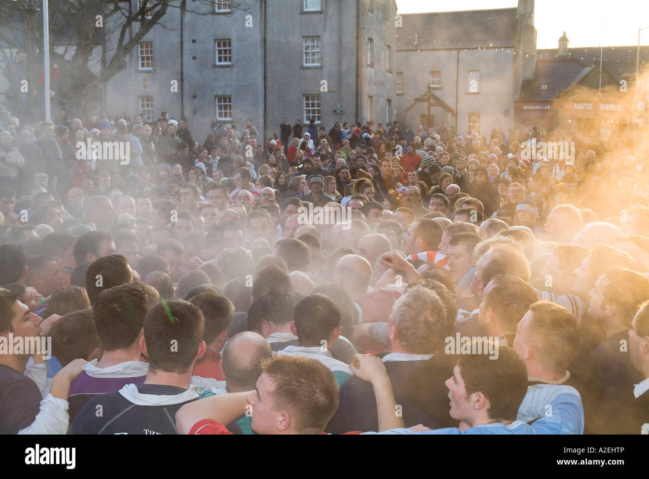 dh Christmas Ba Game KIRKWALL EVENTS ORKNEY SCOTLAND Pack of Ba players spectators in street people mass Stock Photo