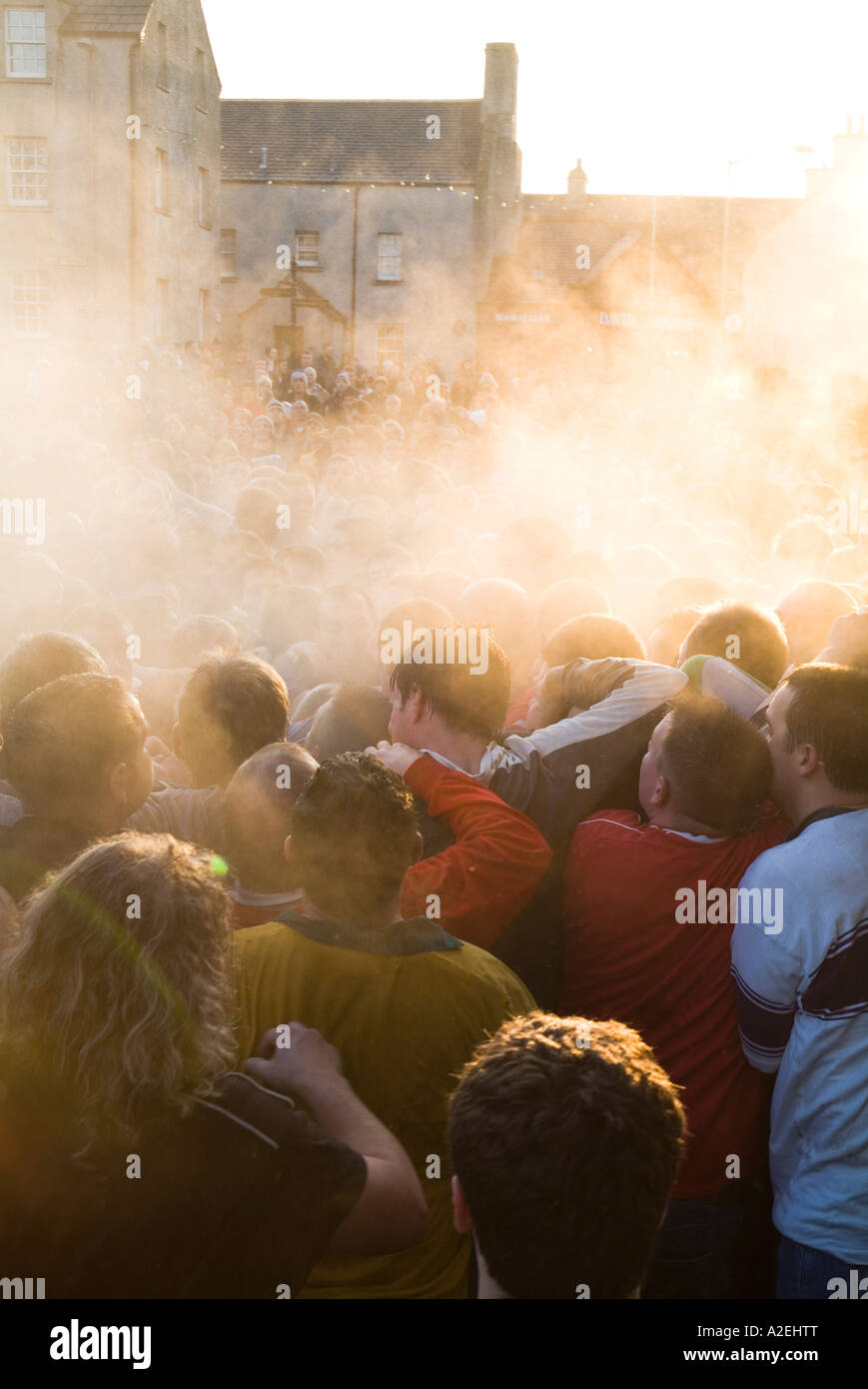 dh The Ba KIRKWALL ORKNEY Steaming pack of Ba players in Broad Street christmas day Stock Photo