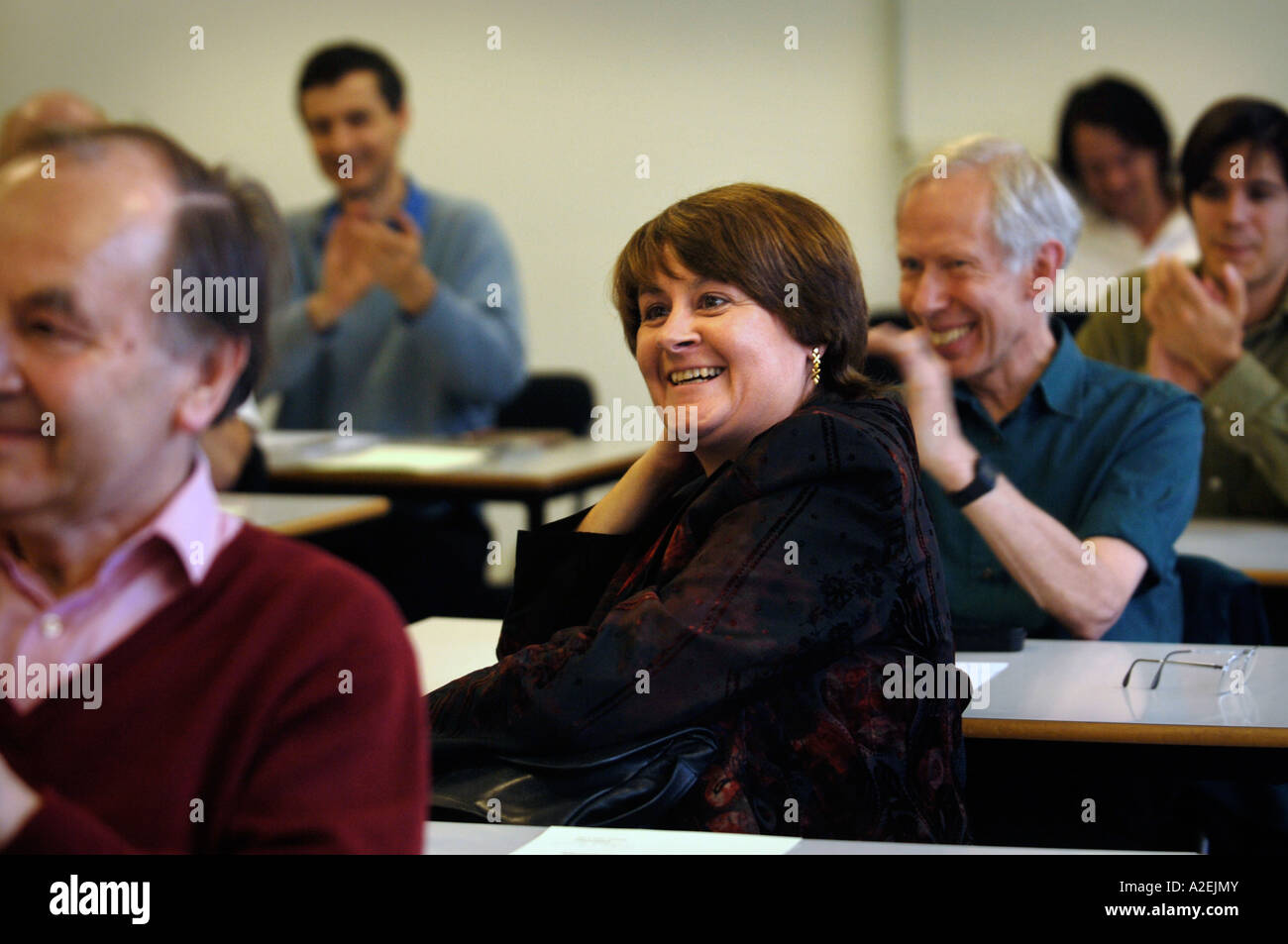 HELEN OUGHAM IS APPLAUDED AFTER WINNING THE TIMES NATIONAL CROSSWORD COMPETITION CUP FINAL DURING THE CHAMPIONSHIPS Stock Photo