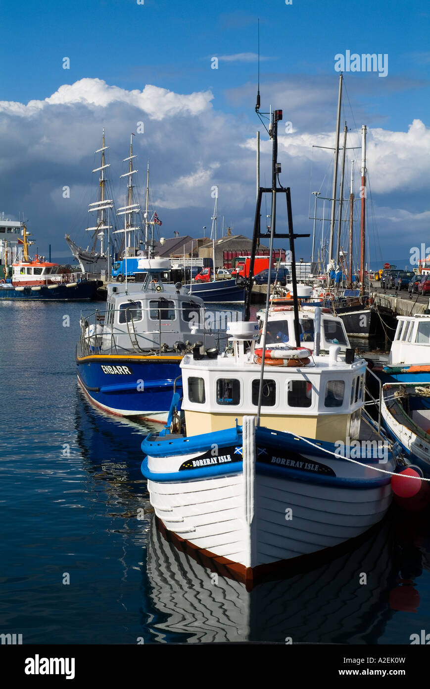dh Kirkwall harbour KIRKWALL ORKNEY Fishing boats alongside quayside and tall ship scottish fishery industry Stock Photo
