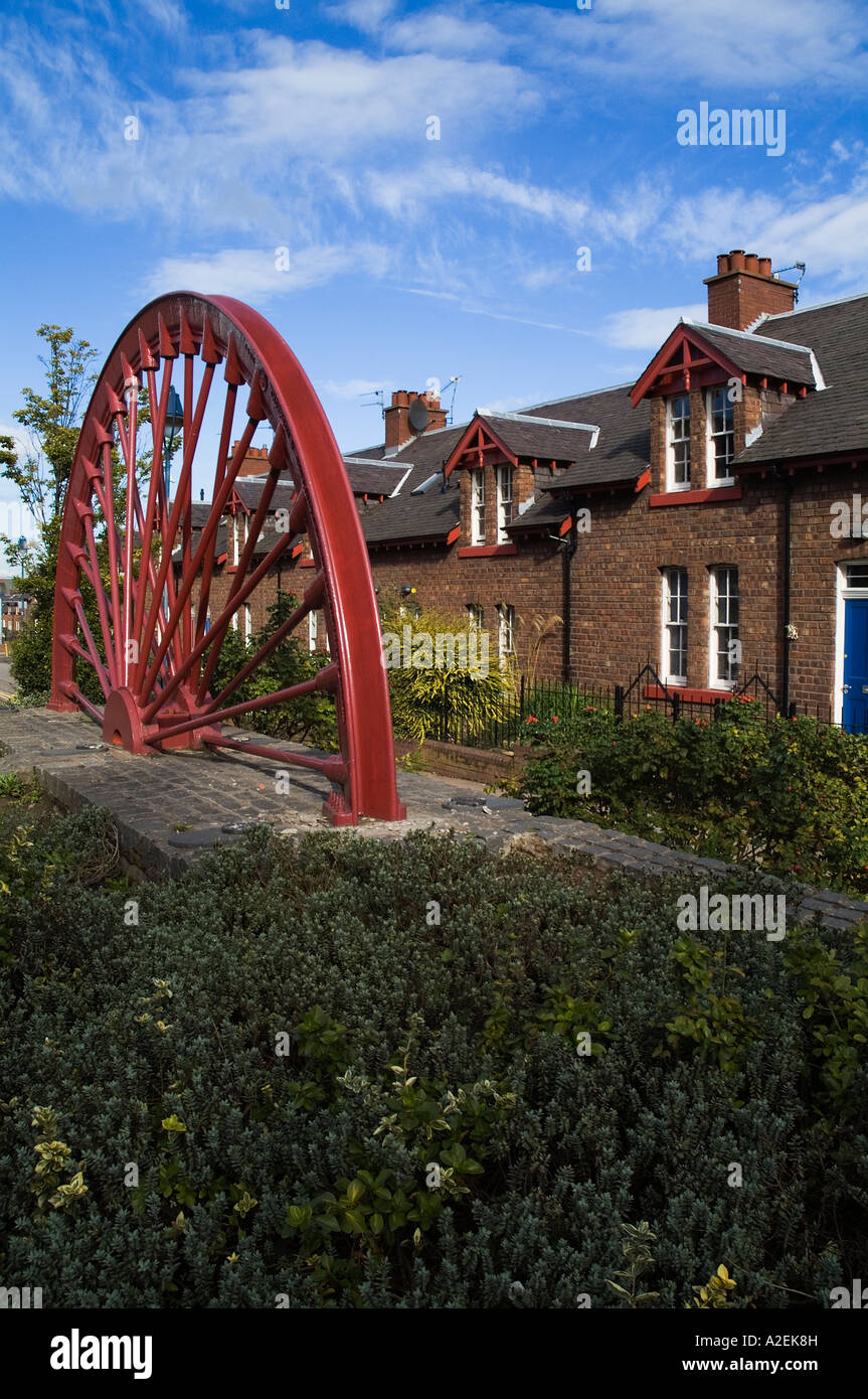 dh  NEWTONGRANGE LOTHIAN Scottish village Traditional miners terraced house town houses pithead wheel scotland row street uk Stock Photo