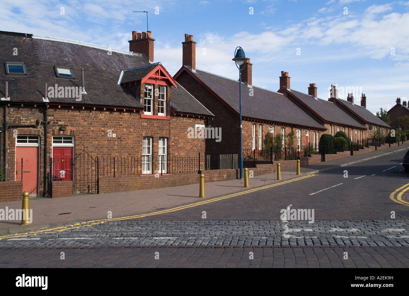 dh  NEWTONGRANGE LOTHIAN Traditional miners bungalow town houses scotland house terraced village uk Stock Photo