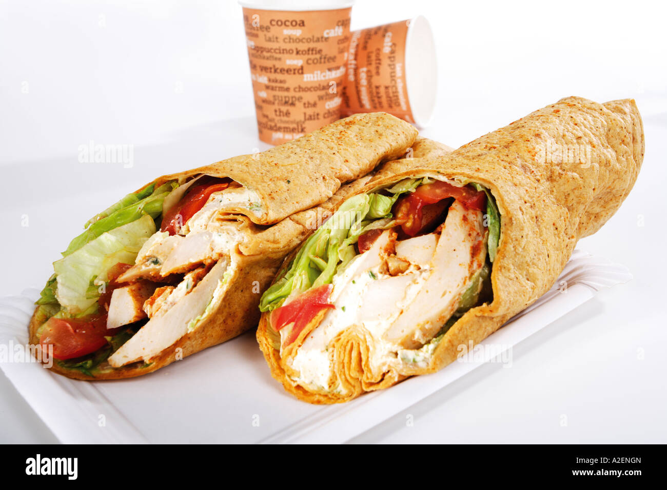 Two wrap sandwiches with white meat and salad, paper cups Stock Photo ...