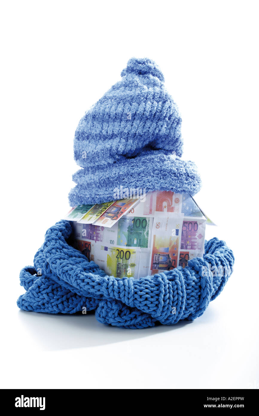 House of Euro notes wrapped in scarf and cap Stock Photo