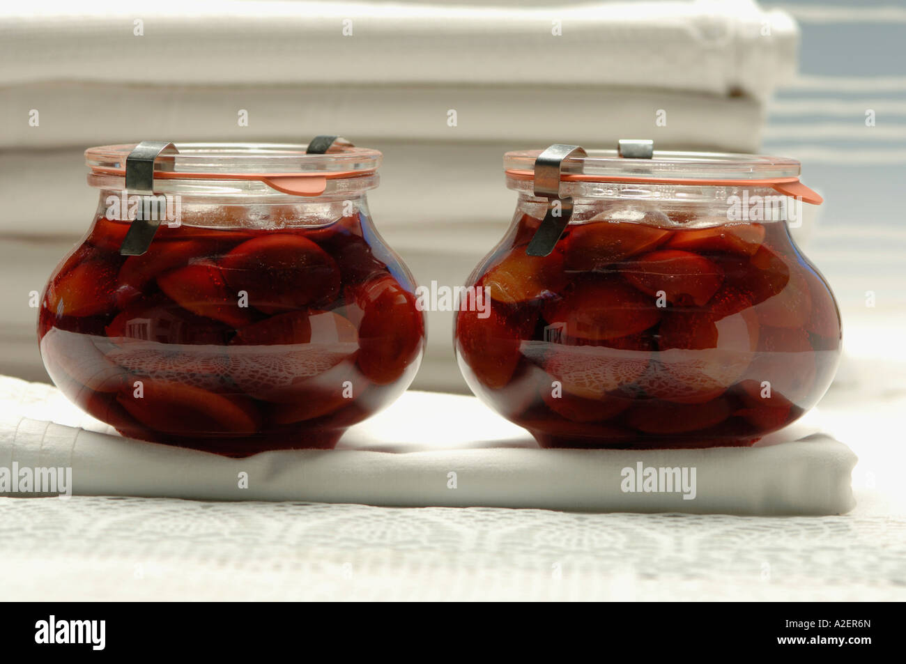 Stewed plum fruit in glass Stock Photo