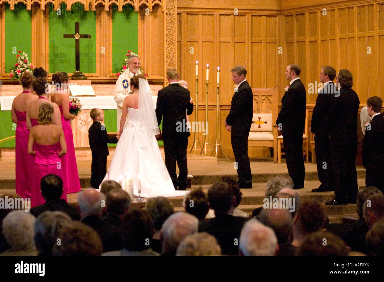 Wedding party participating in the marriage service. First Lutheran Church Fergus Falls