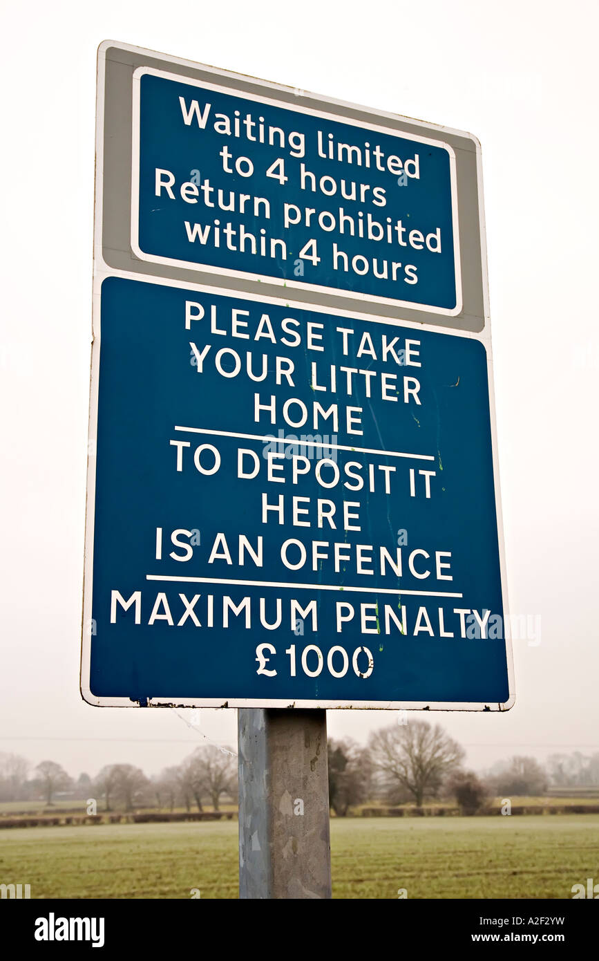 Waiting limited return prohibited take your litter home sign in layby Hereford England UK Stock Photo