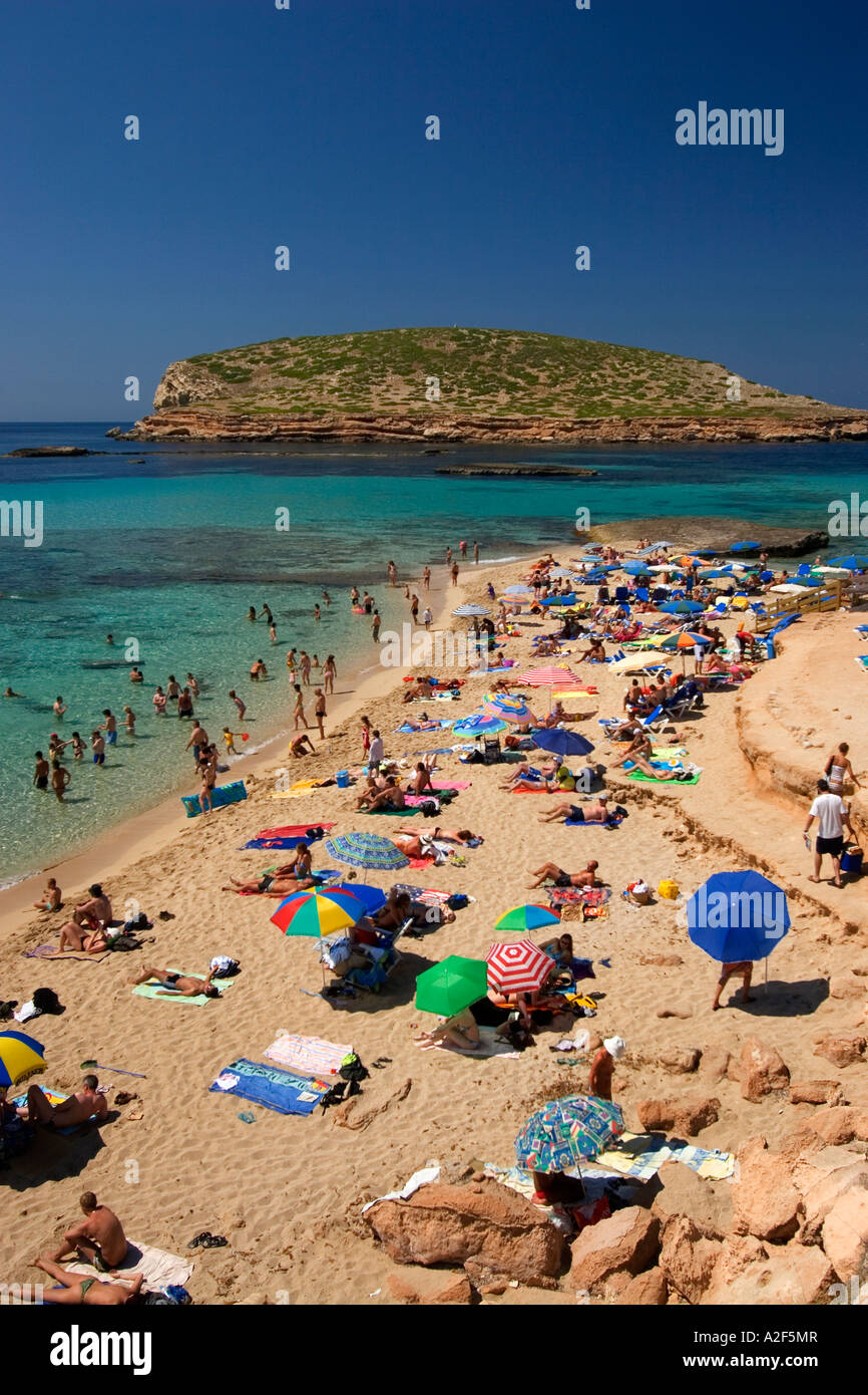 Spanien Balearen Ibiza beach Cala Comte beach people sunbathing Stock Photo