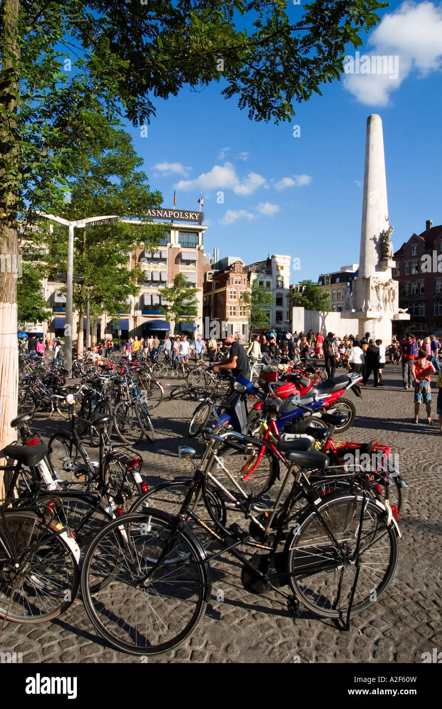 Amsterdam Dam square Obelisk bicycles background Grand Hotel Krasnaposlky Stock Photo