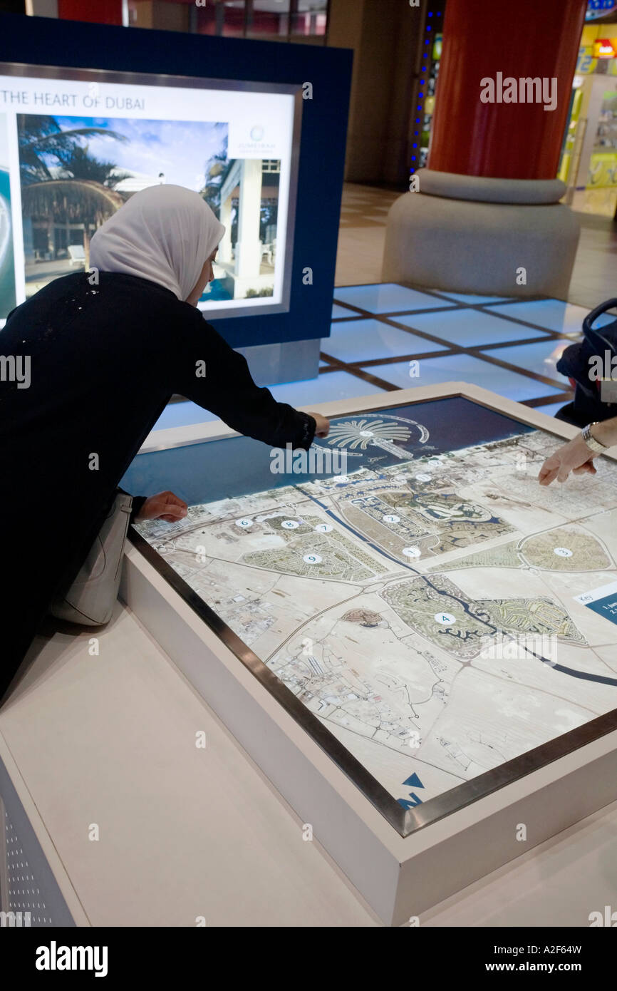 Dubai Ibn Battuta Mall plans for real estate arabian woman Stock Photo