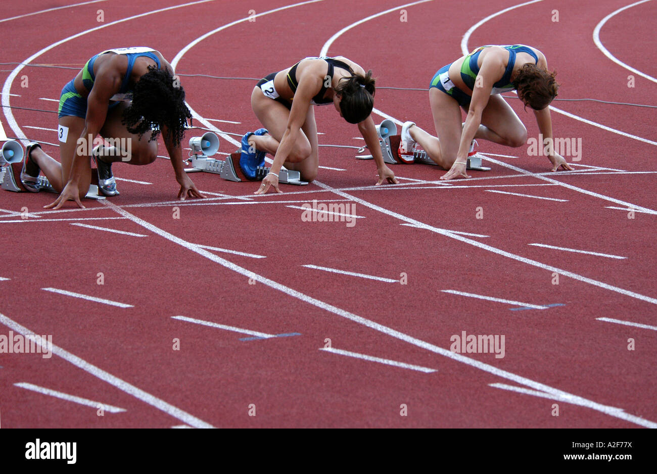 Ready! Set! Go! Athletes ready to start Stock Photo