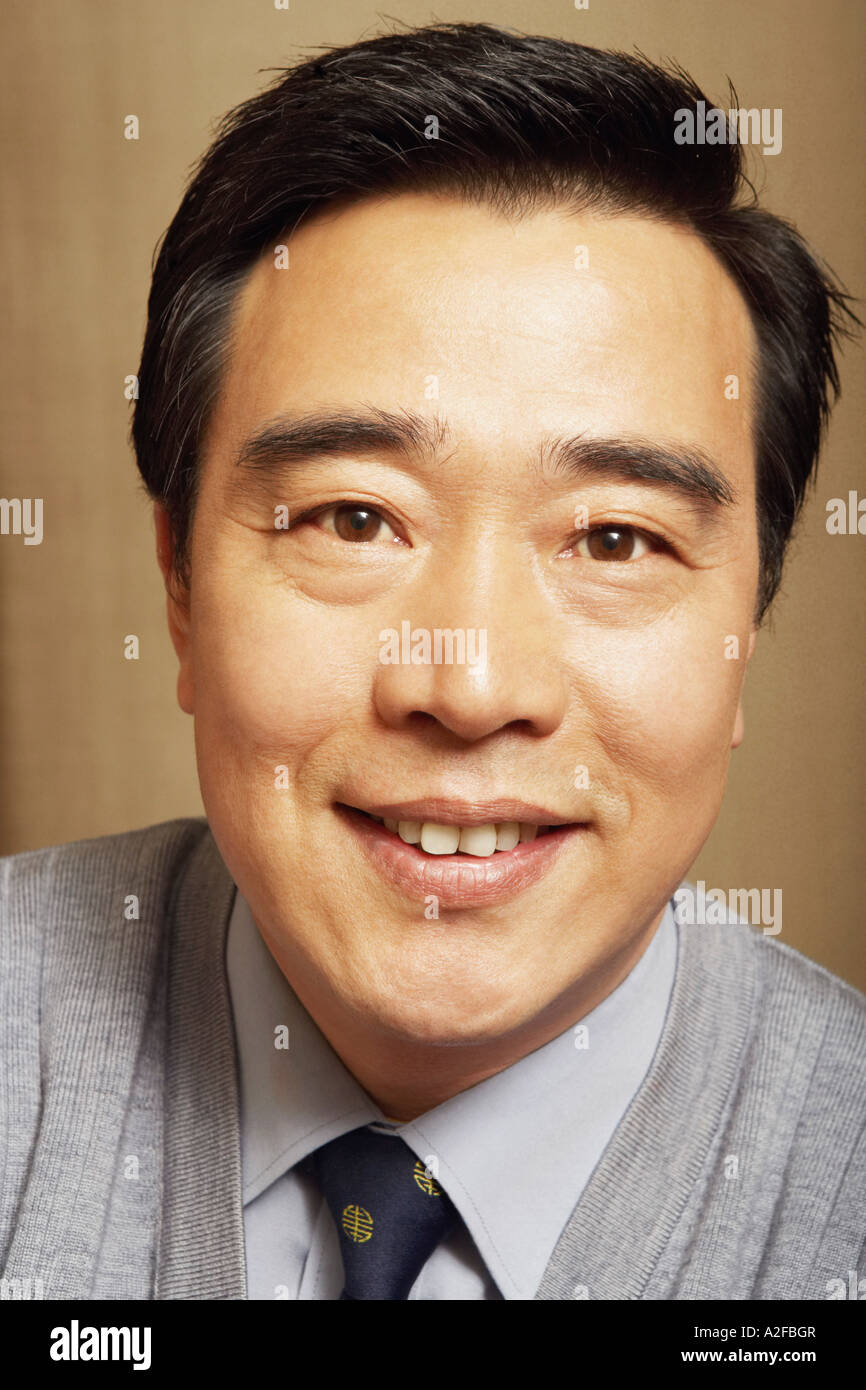 Portrait of a businessman smiling Stock Photo - Alamy