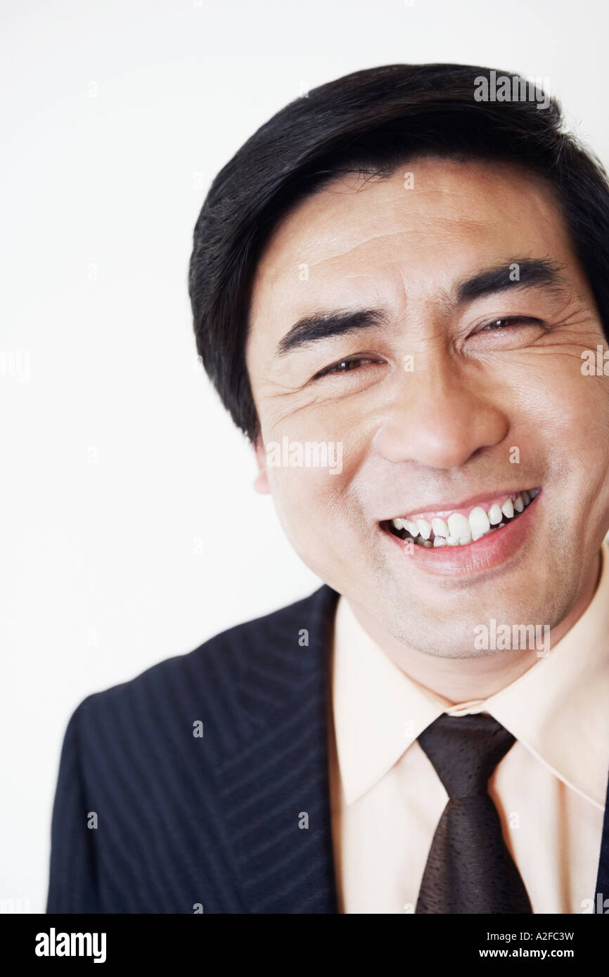 Portrait of a businessman smiling Stock Photo - Alamy