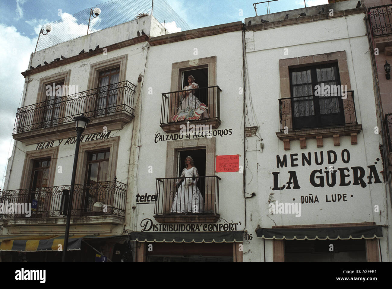 Wedding dress shop front dummies mannequins fun surreal balconies
