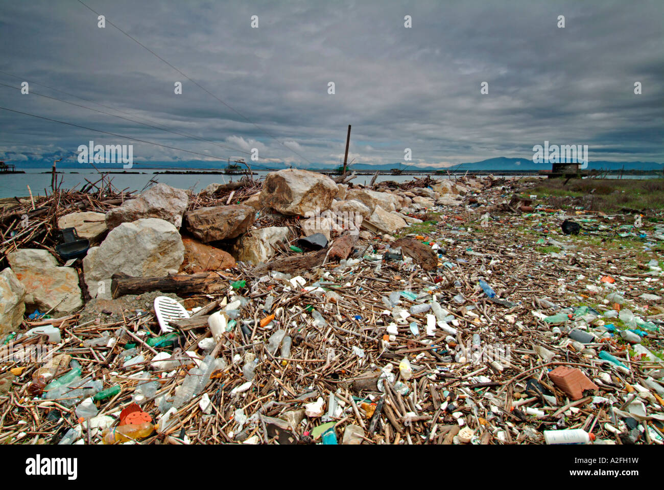 Rubbish on seashore at the beach of Pisa Tuscany Italy Stock Photo - Alamy