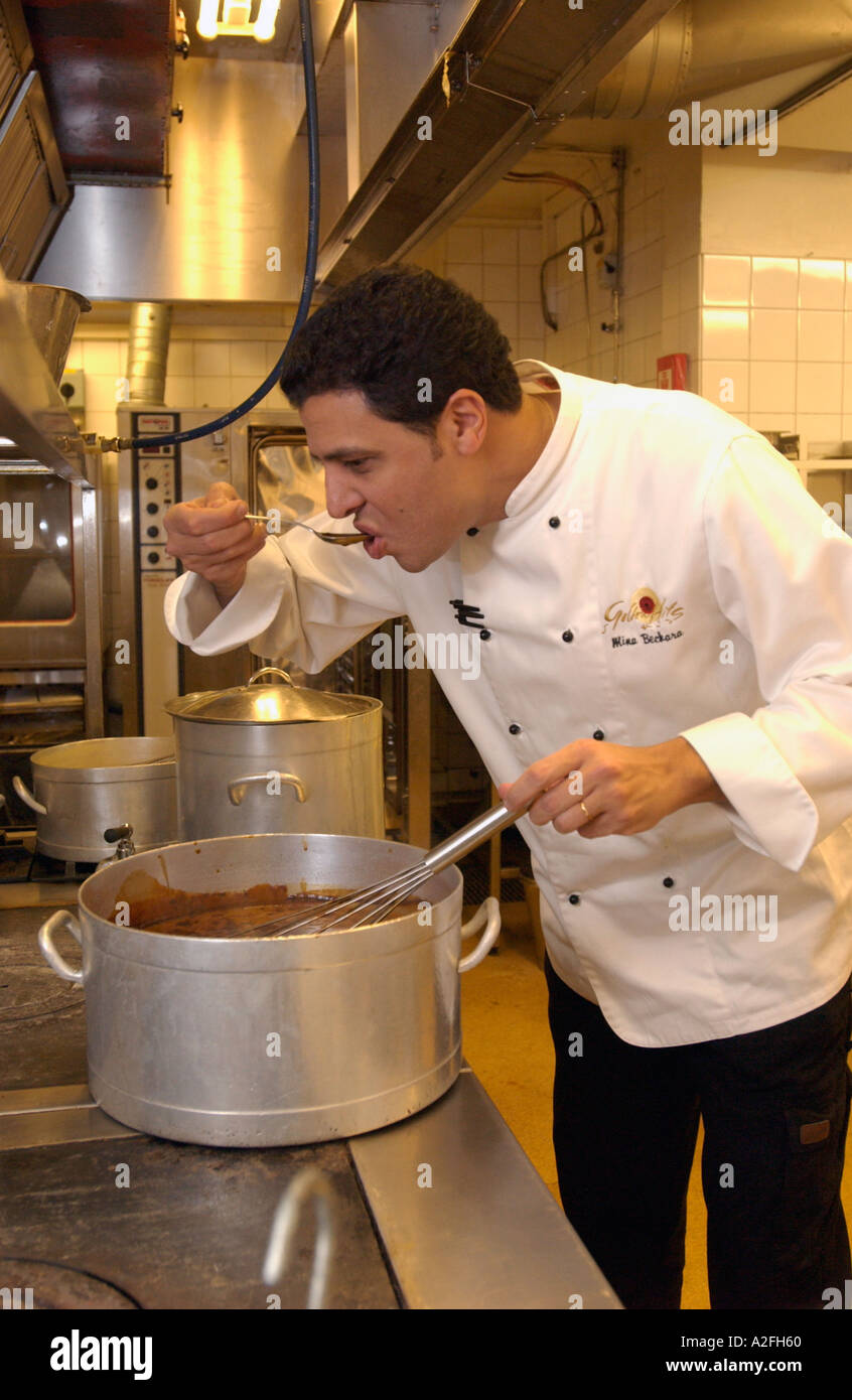 chef at work in restaurant kitchen Stock Photo