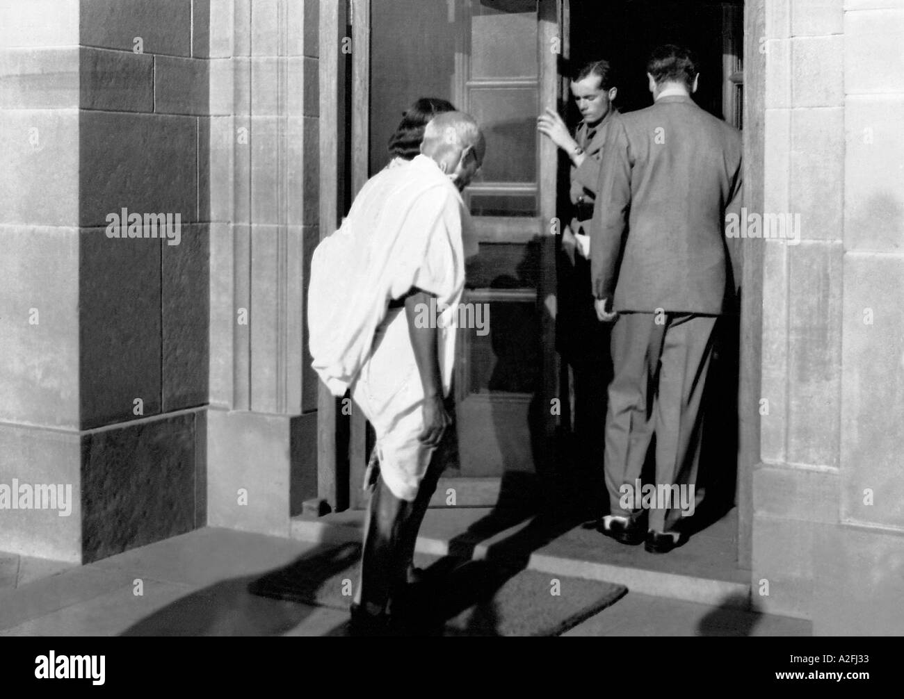 Mahatma Gandhi during his first meeting with British Viceroy Lord Mountbatten and his wife at New Delhi India 31 March 1947 Stock Photo