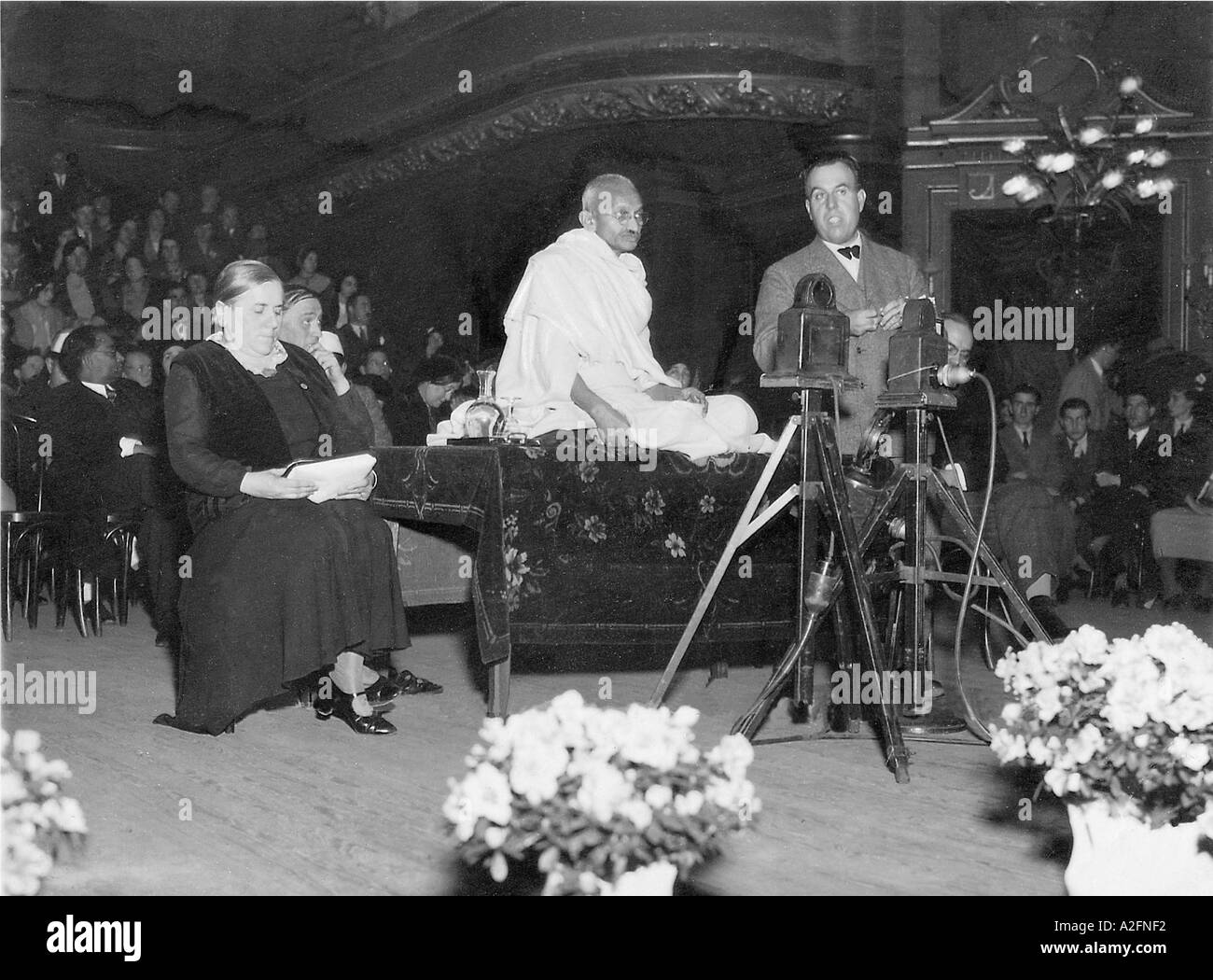 Mahatma Gandhi sitting talking to International Workers and Labourers at Peoples Hall in Lausanne Switzerland Europe 1931 Stock Photo