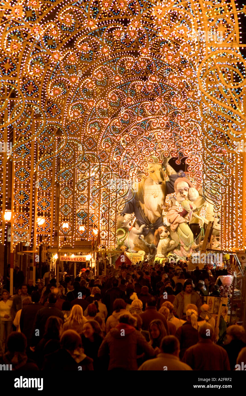 LAS FALLAS SCULPTURE AT THE END OF A TUNNEL OF LIGHTS. VALENCIA. SPAIN EU Stock Photo