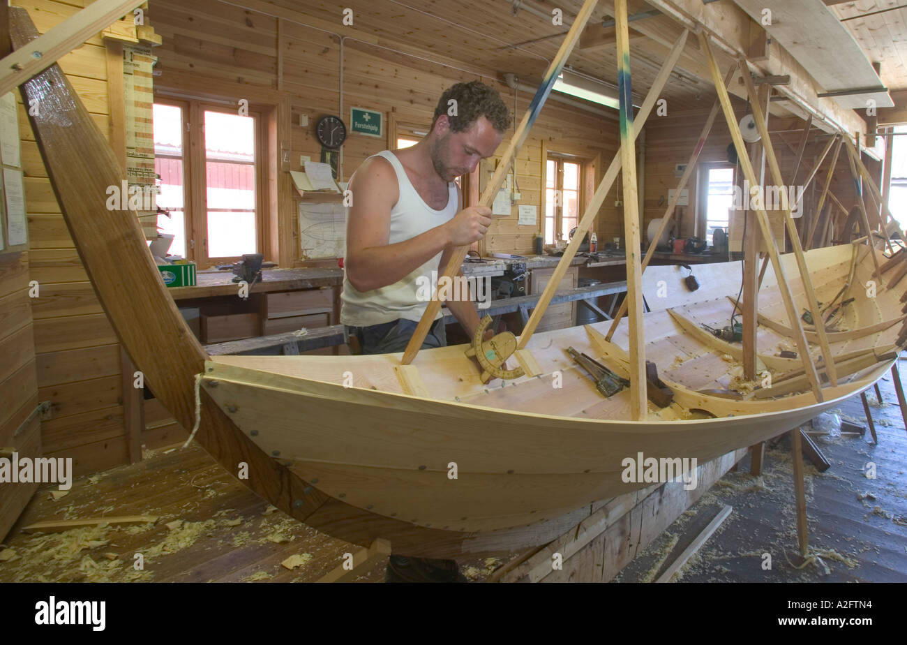 A traditional lapstrake rowboat being built with traditional ...