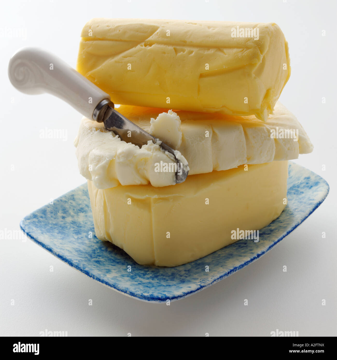 A stack of butter pats Stock Photo Alamy