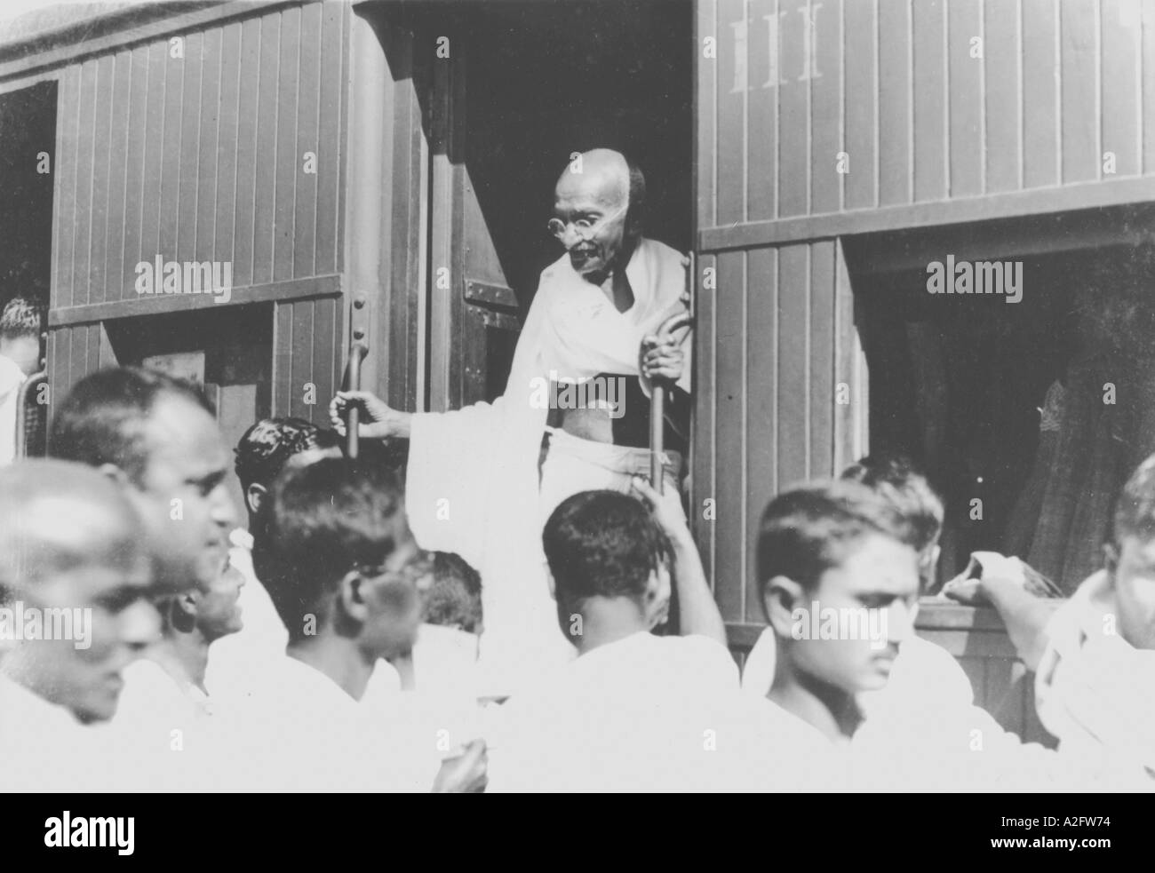 MKG33144 Mahatma Gandhi in a third class train compartment leaving ...