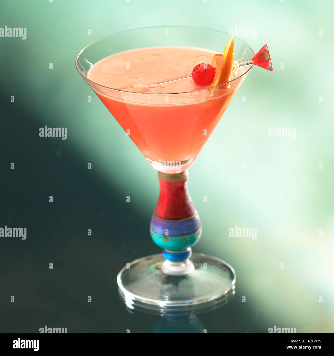 Cocktail Island in the Sun Orange Ouzo Grenadine ice Keywords drink alcohol  Stock Photo - Alamy