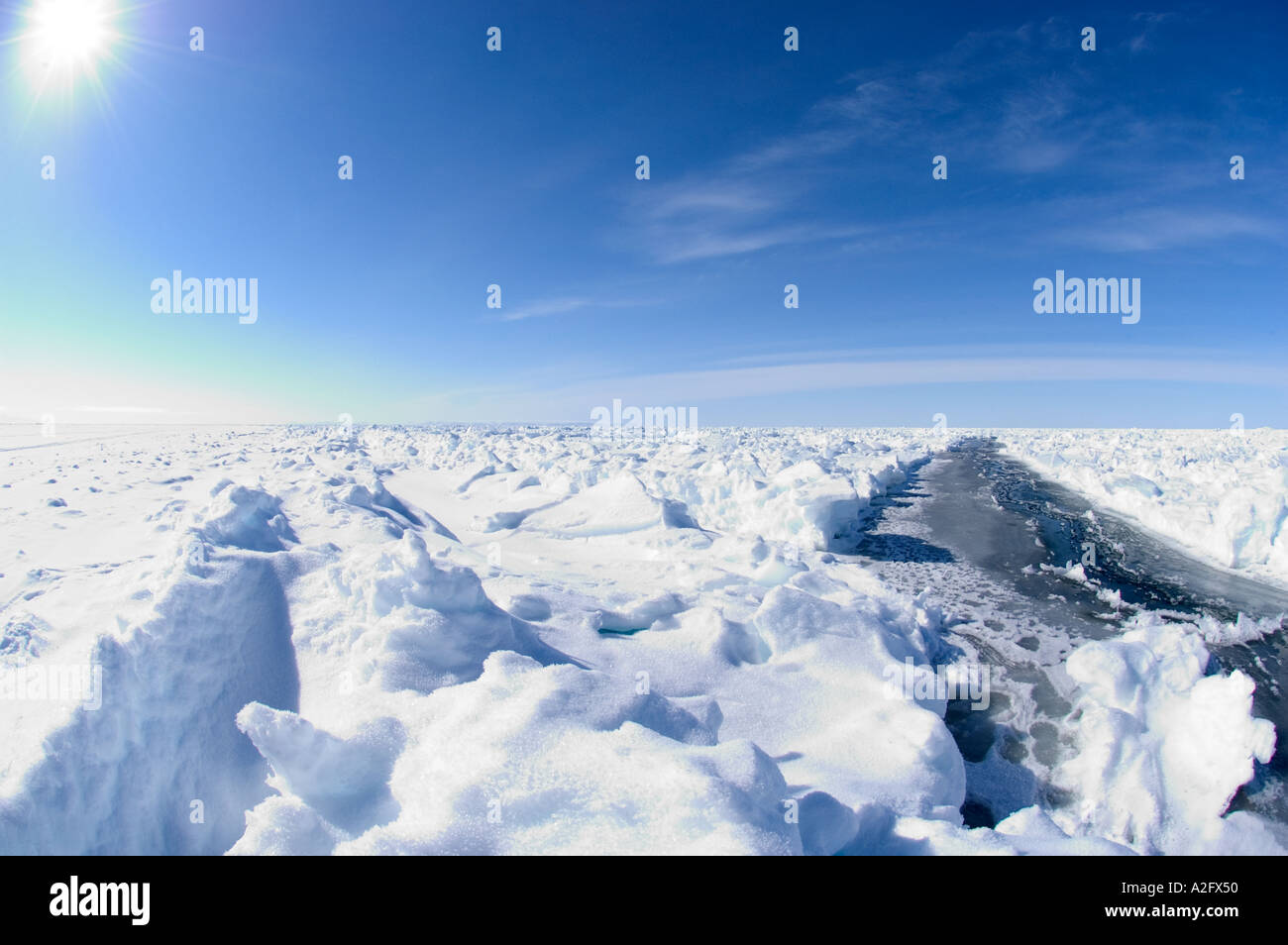 Crack opening in the sea ice in Arctic spring under the midnight sun ...