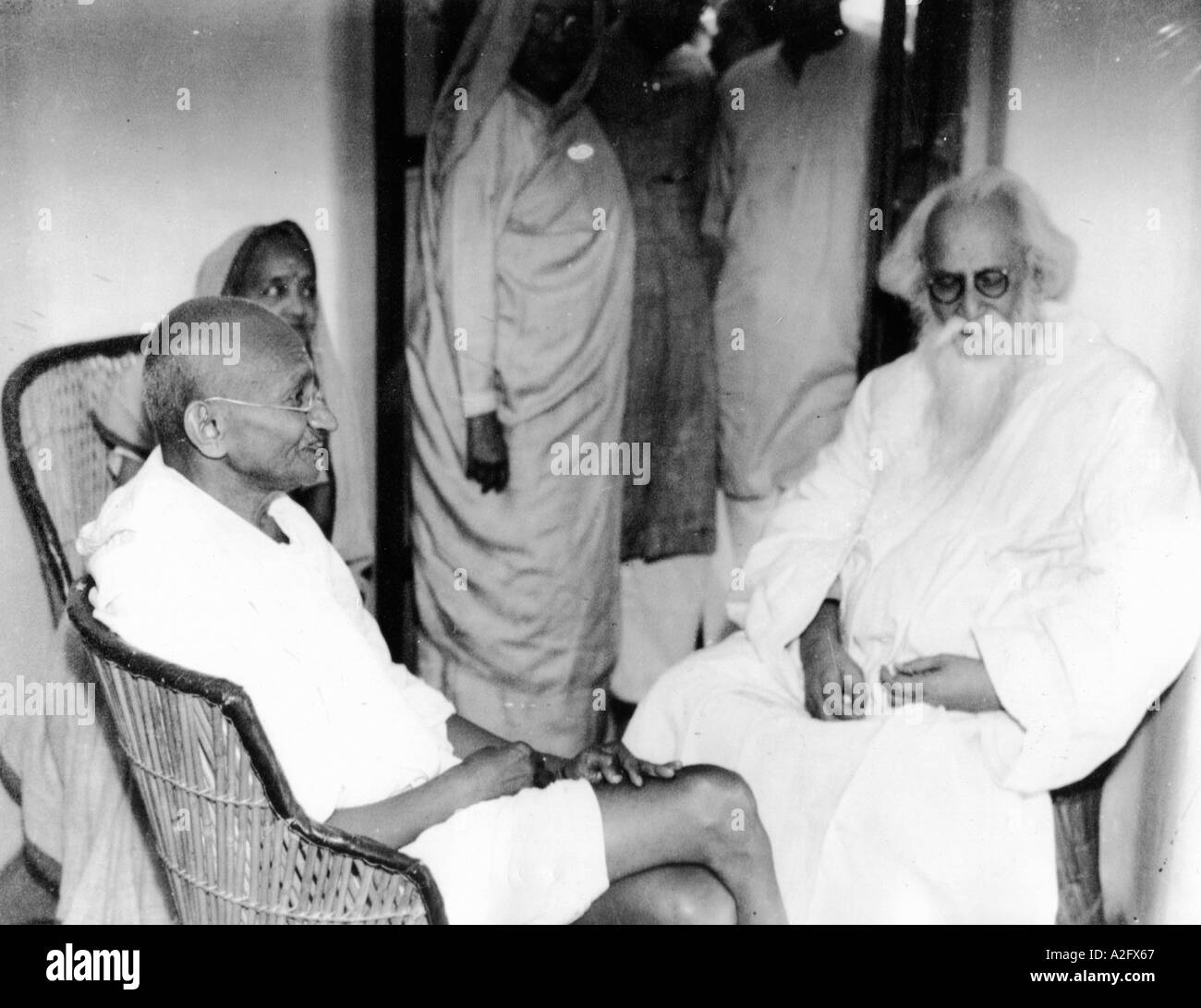 Rabindranath Tagore with Mahatma Gandhi and wife Kasturba Gandhi in mud ...