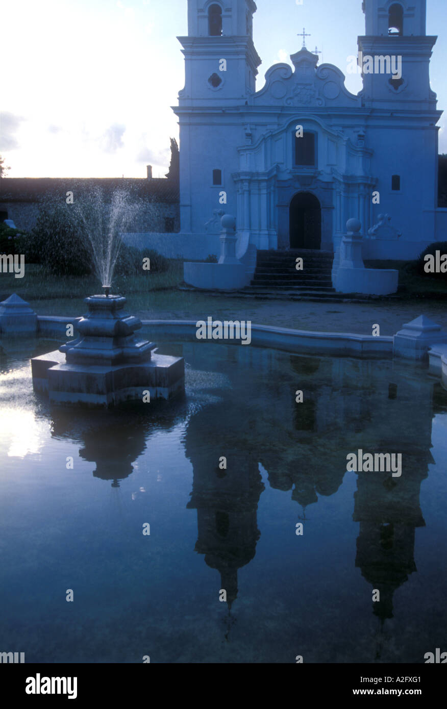 Santa Catalina Jesuit Church from XVII century, reflected in a fountain Stock Photo