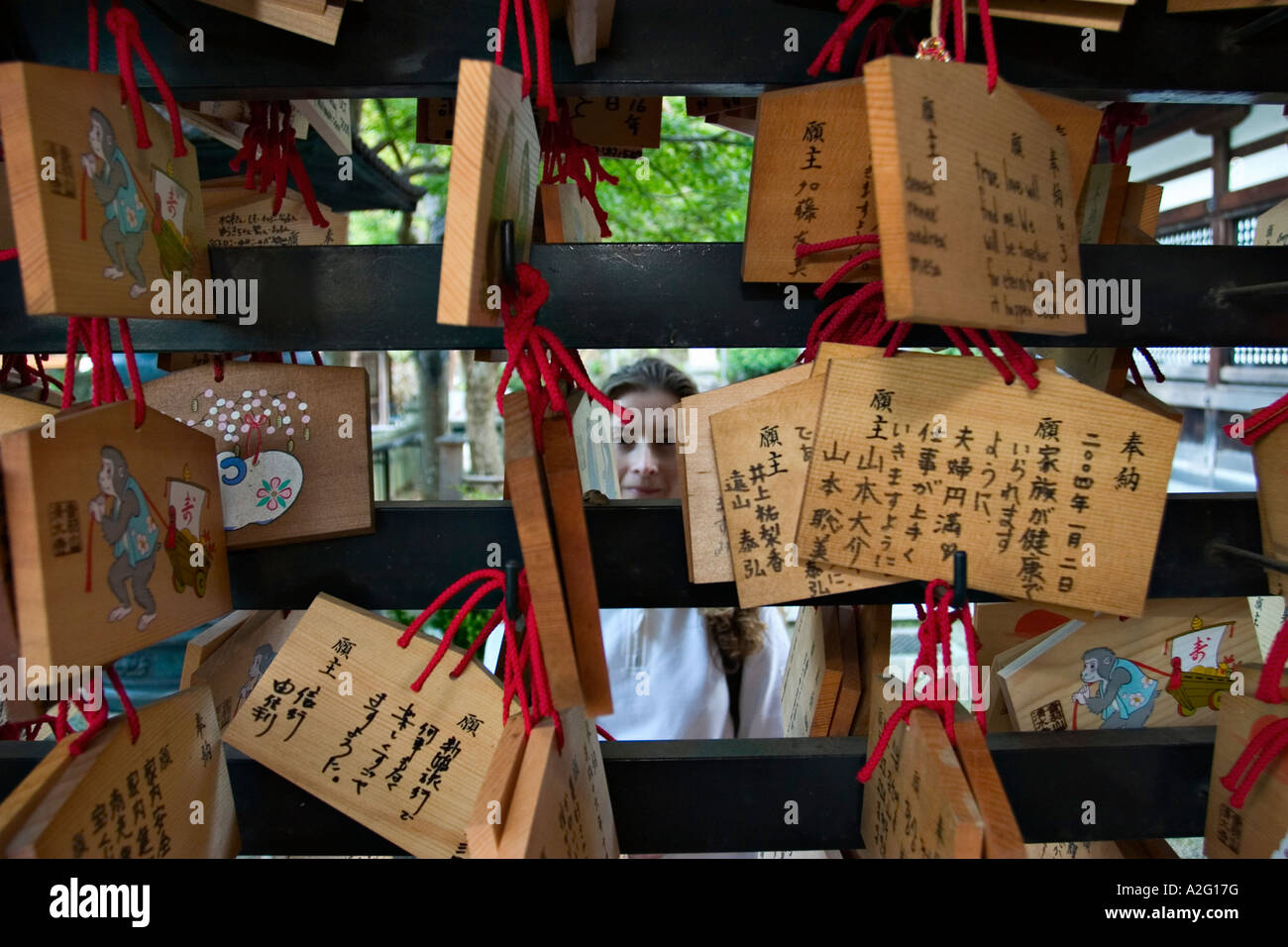 Wooden plaques (Ema) with prayers at a Shinto shrine Stock Photo
