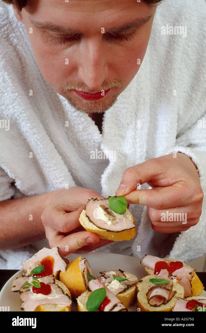 1222043 indoor flat young man 25 30 dark haired white dressing gown