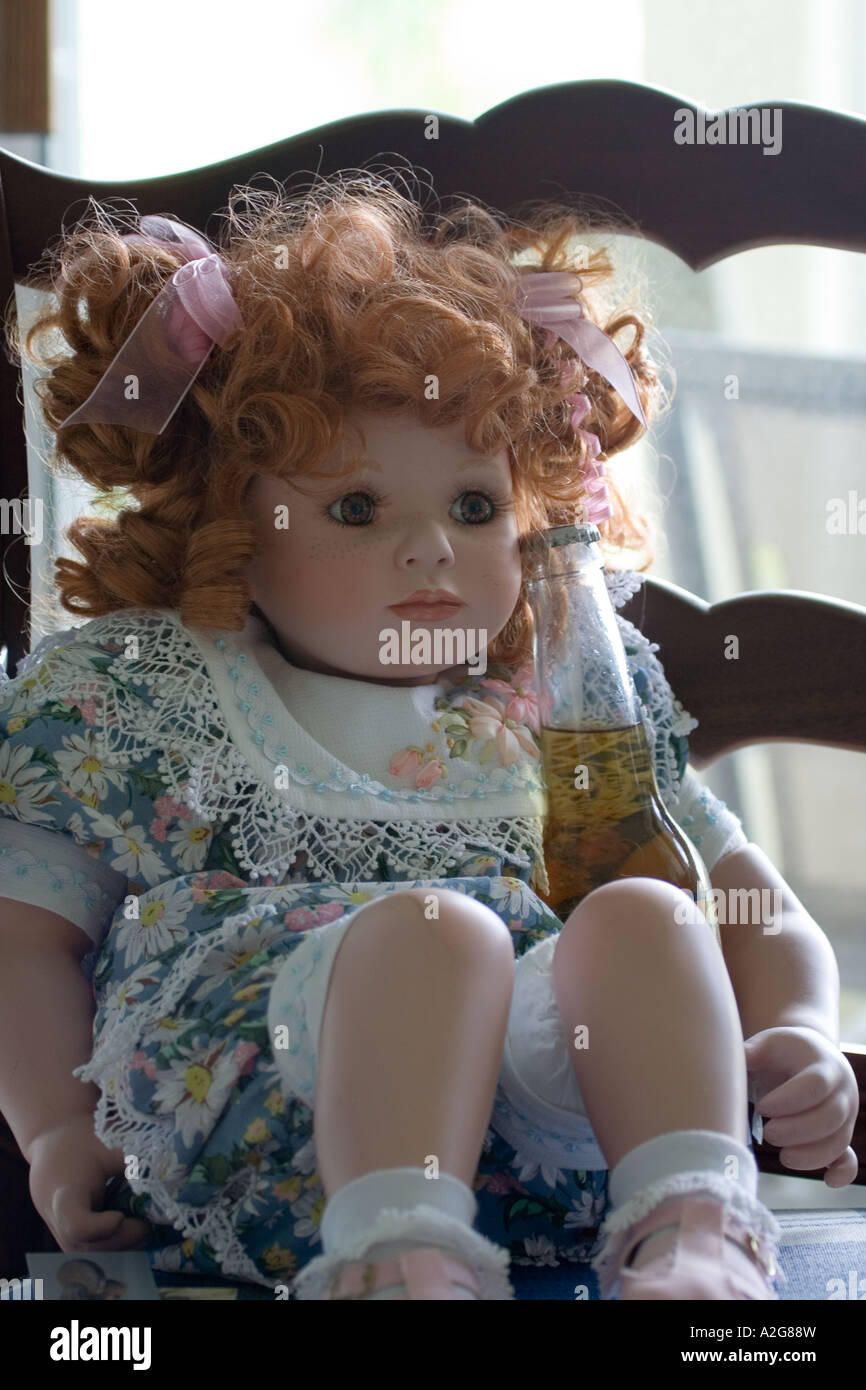 Doll Sitting On Chair With Beer Stock Photo Alamy