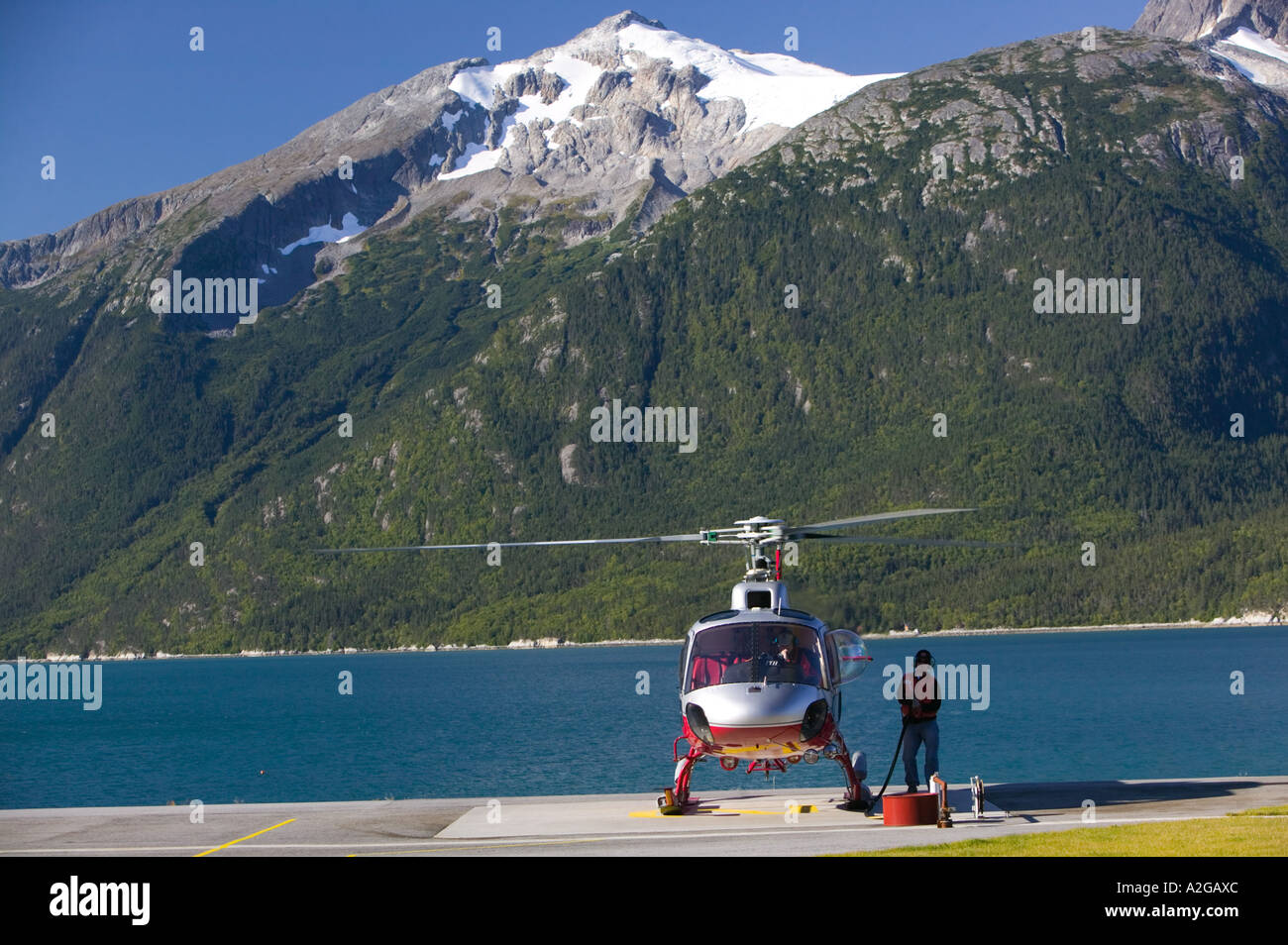 USA, ALASKA, Southeast Alaska, SKAGWAY: Temsco Helicopter taking tourists on Glacier Tours Stock Photo