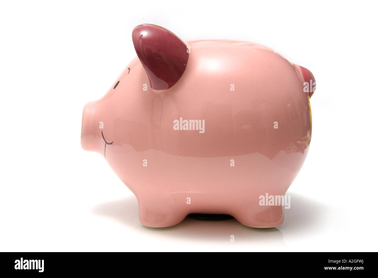 Piggy bank style money box isolated on a white studio background Stock ...