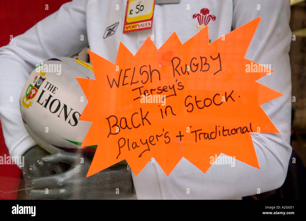 Rugby display in sports shop window in Cardiff city centre South Wales