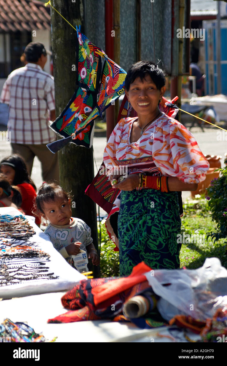 Young Kuna woman sells molas and other crafts at El Valle de Anton Market in Coclé, Republic of Panama, Central America Stock Photo