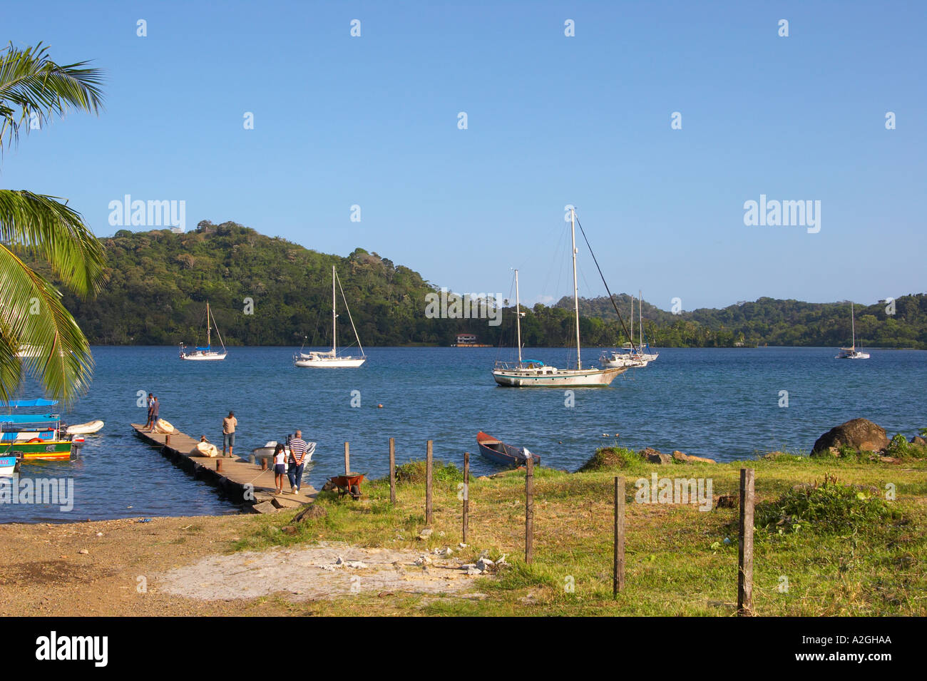 Sailboats and water taxis near the Portobelo pier. Province of Colon ...