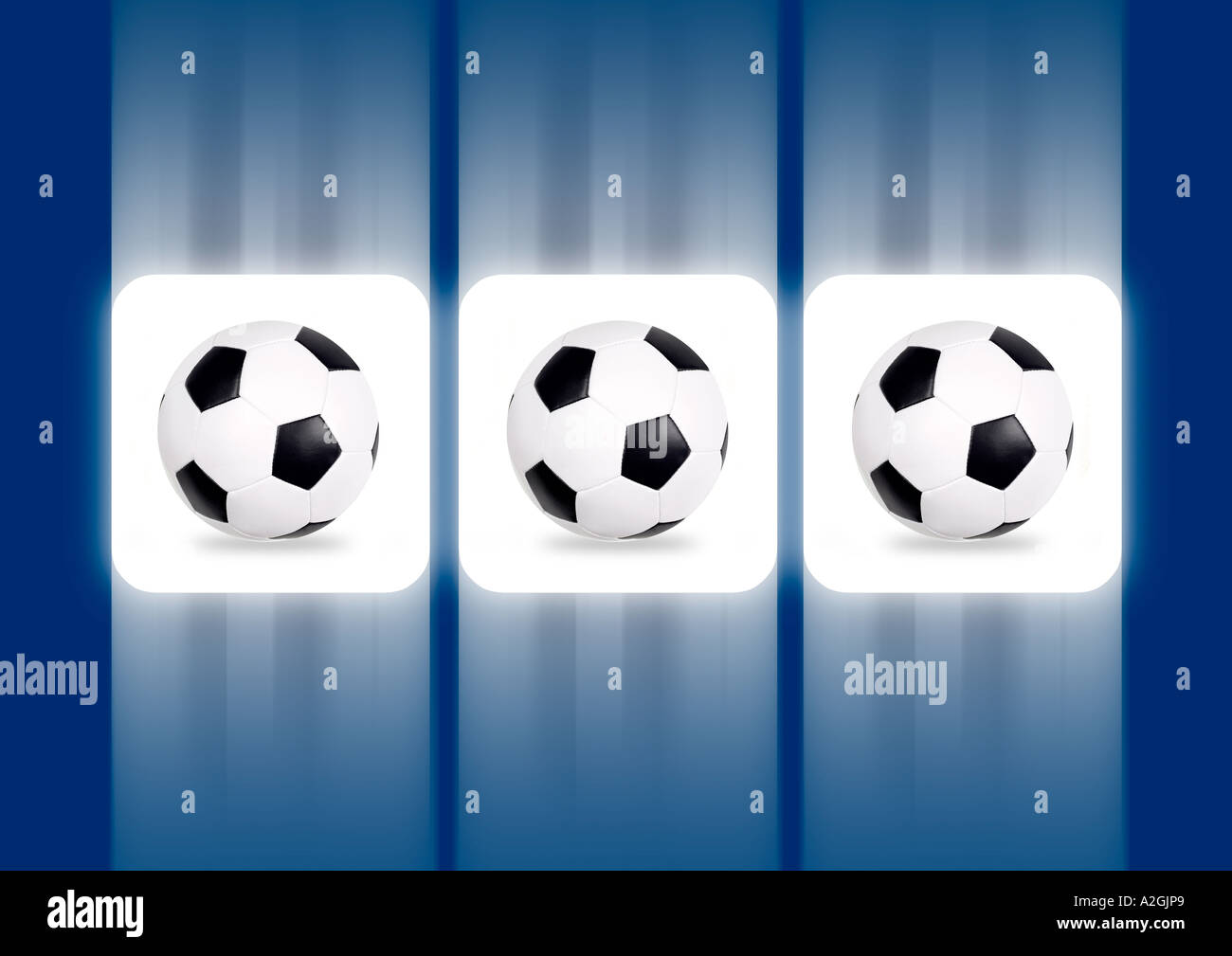 Three balls on a slot machine display 3 Fußbälle auf dem Display eines Spielautomaten Stock Photo