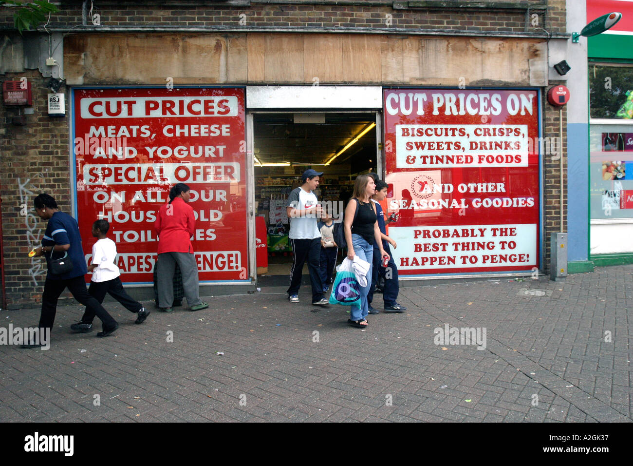 People shopping at a bargain discount food shop in Penge London Stock