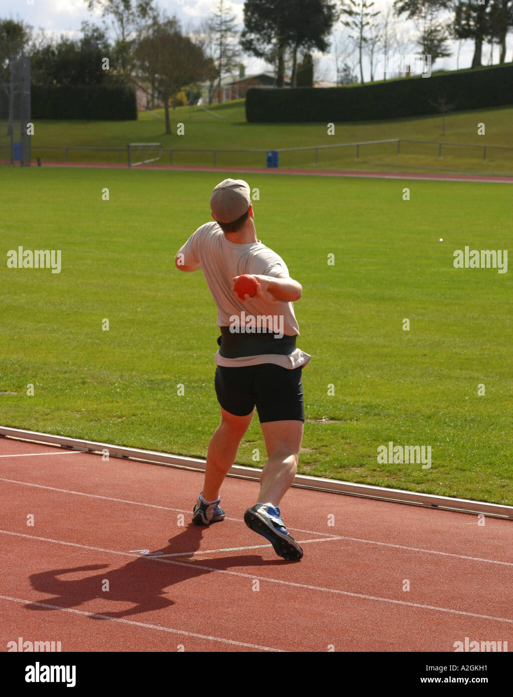 Javelin athlete practising throwing with weights Stock Photo Alamy