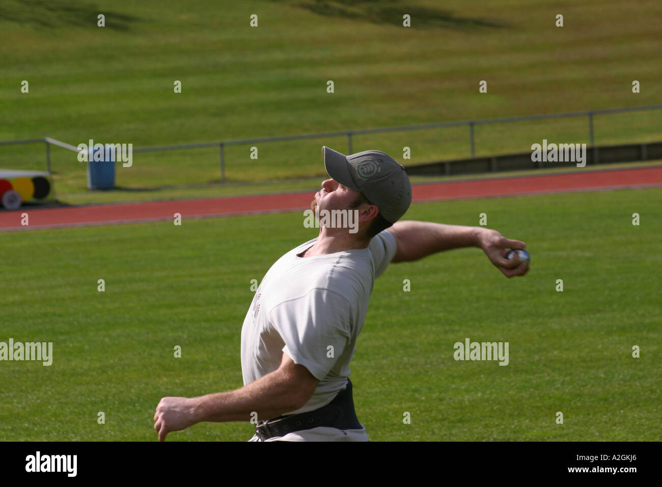 Javelin athlete practising throwing with weights Stock Photo Alamy