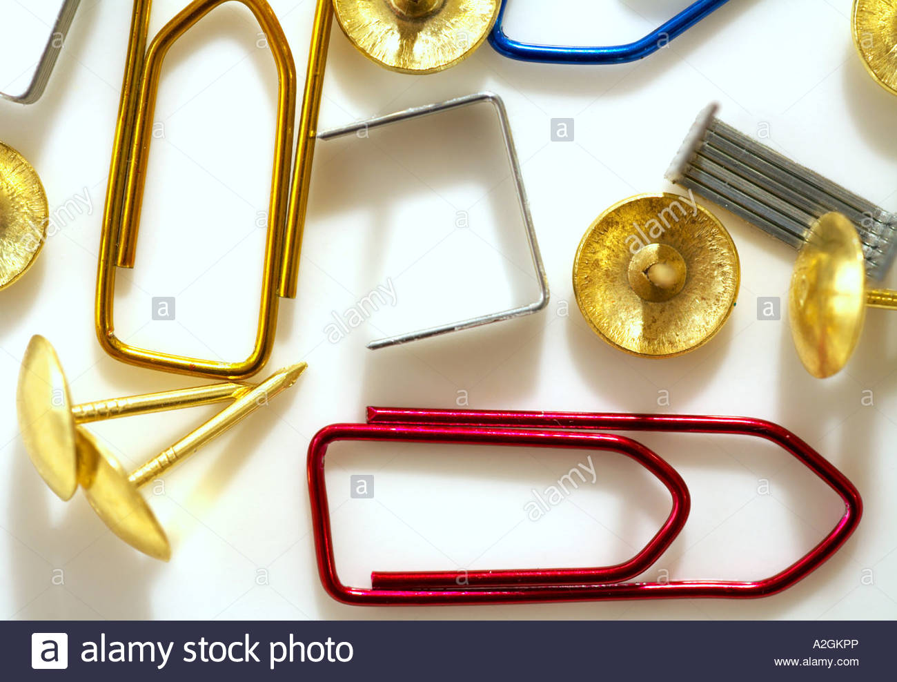 Paperclips, drawing pins and staples Stock Photo Alamy