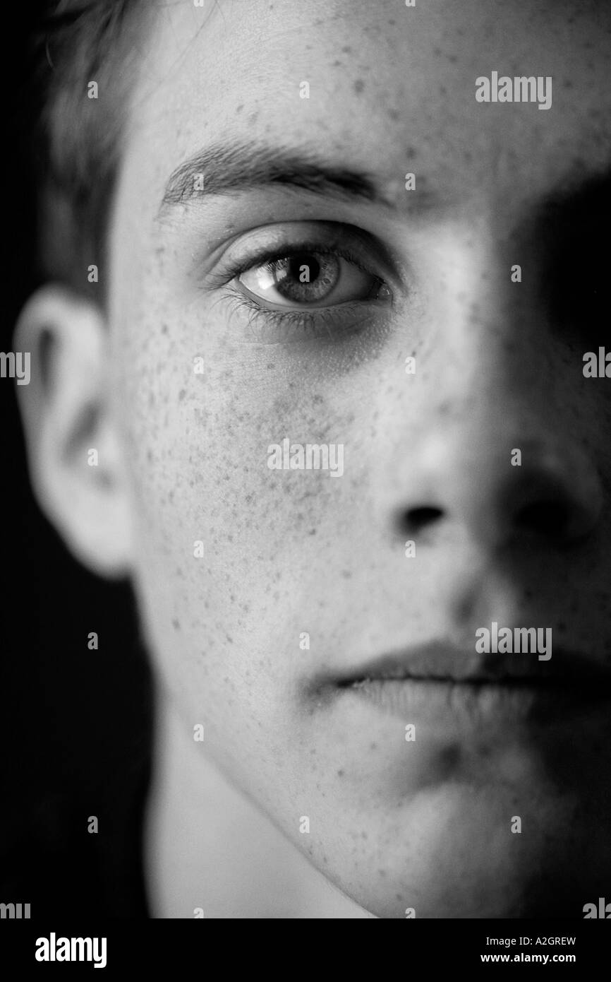 Black and white portrait of half of a boy's face Stock Photo