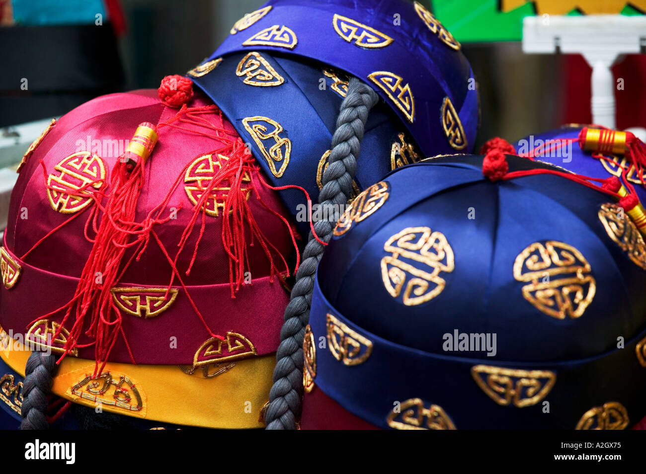 Hats on stall in old China Town market Singapore The traditional 