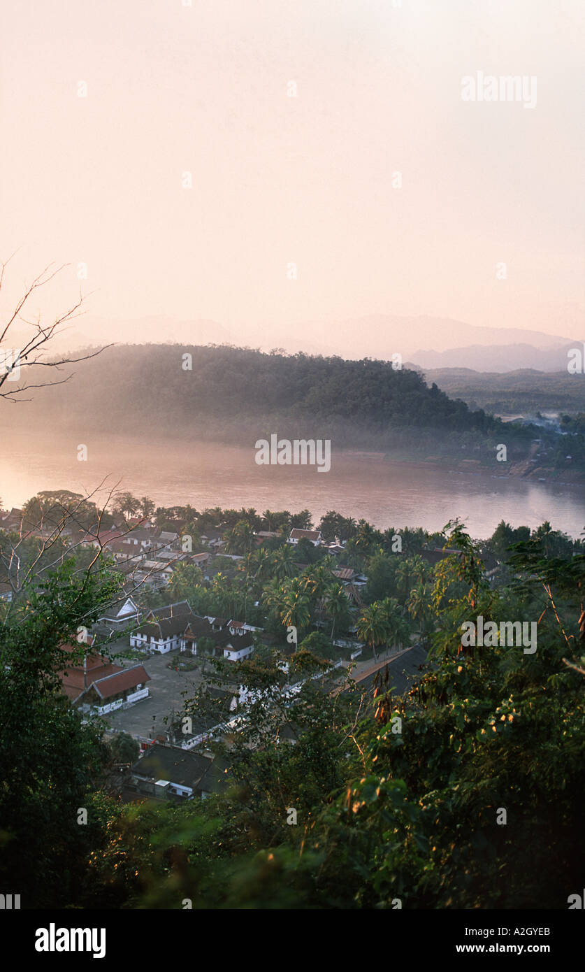 View of Luang Prabang below and across to the village on the opposite bank of the Mekong Sunset from Phousi hill Laos Stock Photo