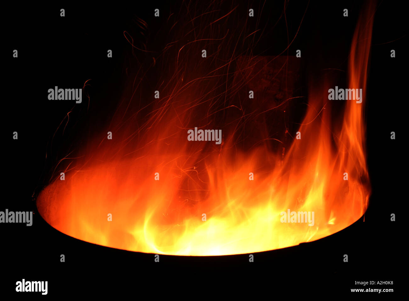 fire in an oil drum Stock Photo Alamy